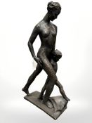 A contemporary resin sculpture depicting mother with child, height 60 cm.