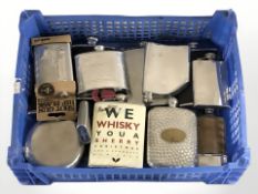 A quantity of hip flasks.