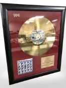 A The Beatles A Hard Day's Night limited edition vinyl disc, numbered 35 of 500, in frame,