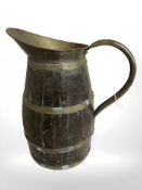 A 19th century coopered oak and brass harvest jug, height 43 cm.