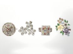 Four Sterling silver dress rings