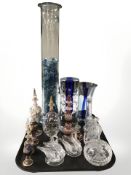 A group of decorative glass scent bottles, crystal items, vase, candle holder,