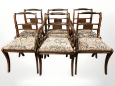 A set of six Regency style mahogany dining chairs.
