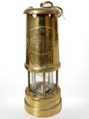 A British Coal Mining Company Wales brass miner's safety lamp.