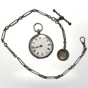 A silver fob watch and a watch chain with Victorian sixpence