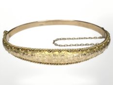 A 9ct gold hinged bangle CONDITION REPORT: 7.