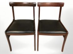 A pair of 20th century Danish teak dining chairs.