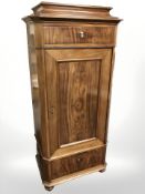 An early 20th century Danish mahogany single door pedestal cabinet with shelved interior,