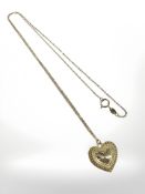 A 9ct gold heart pendant on chain