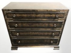An early 20th century stained four drawer chest,