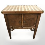 A mid century beech double door side cabinet, width 65 cm.