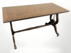 A reproduction mahogany rectangular coffee table, width 82 cm.