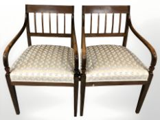 A pair of inlaid mahogany armchairs,