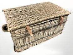 A wicker hamper, width 80 cm.