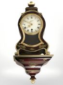 A Schmid reproduction bracket clock, with pendulum and key, overall height 43 cm.