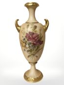 A Royal Worcester blush ivory twin handled vase, shape No. 2049, height 23 cm.