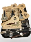 The Beatles - A quantity of collector's quartz wristwatches, some in guitar shaped wooden cases.