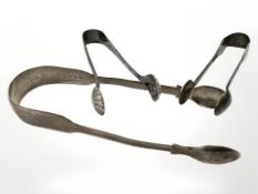 Three pairs of antique silver sugar tongs. CONDITION REPORT: 69.8g.
