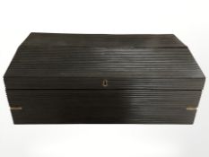 An ebonised writing slope.