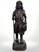 A Dutch carving of a man with walking stick, height 38 cm.
