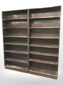 A pair of stained teak open bookcases,