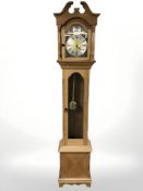 A Brixon Tempus Fugit longcase clock with pendulum and weights,