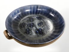 A Danish studio pottery twin handled shallow dish, signed 'Banagolm, Danmark', diameter 36 cm.