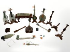 A group of Chinese polished jade or similar hard stone miniature musical instruments (losses)
