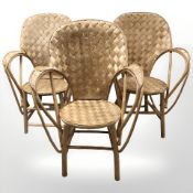 Three wicker armchairs