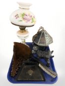 A leaded stained glass lantern, an oil lamp, a corner wall bracket,