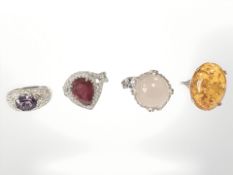 Four Sterling silver dress rings