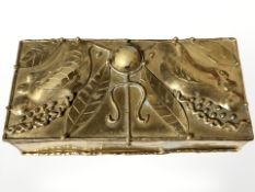 An Arts and Crafts style brass trinket box, width 14.5 cm.