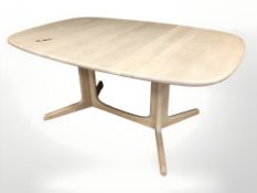 A 20th century Danish washed oak dining table, length 162 cm.