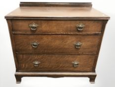 An early 20th century oak three drawer chest, 92 cm W x 47 cm D x 85 cm H.