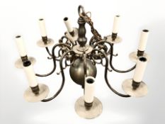 A brass eight scone chandelier