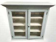 A painted pine double door cabinet with shelved interior, 107 cm W x 38 cm D x 103 cm H.