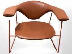 A contemporary metal framed leather upholstered armchair, width 81 cm.