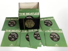 The Beatles - A box set of twenty four vinyl 7