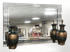 A modern all-glass mirror, 120 cm x 80 cm, and a pair of ceramic table lamps.