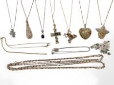 A group of sterling silver and gold plated chains, pendants, crucifix, etc.