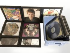 The Beatles - A collection of LP record display frames, some containing albums.