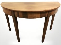 A George III style mahogany demi-lune hall table, width 123 cm.