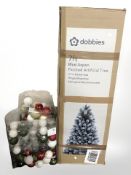 A seven foot artificial Christmas tree, in box, and a quantity of baubles.