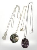 Three Sterling silver pendants on chains