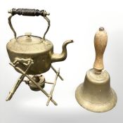 A brass spirit kettle on stand, height 30 cm, and a Victorian brass school bell.