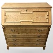 A 20th century Danish blond oak bureau,