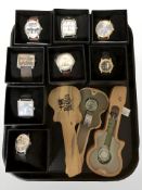 The Beatles - A quantity of collector's quartz wristwatches, some in guitar shaped wooden cases.
