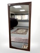 A mid century teak framed mirror, 43 cm x 88 cm.