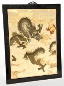 A Chinese lacquered panel depicting a dragon, 60 cm x 45 cm.
