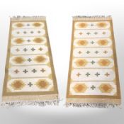 A pair of flatweave Kilims, each 175 cm x 79 cm.